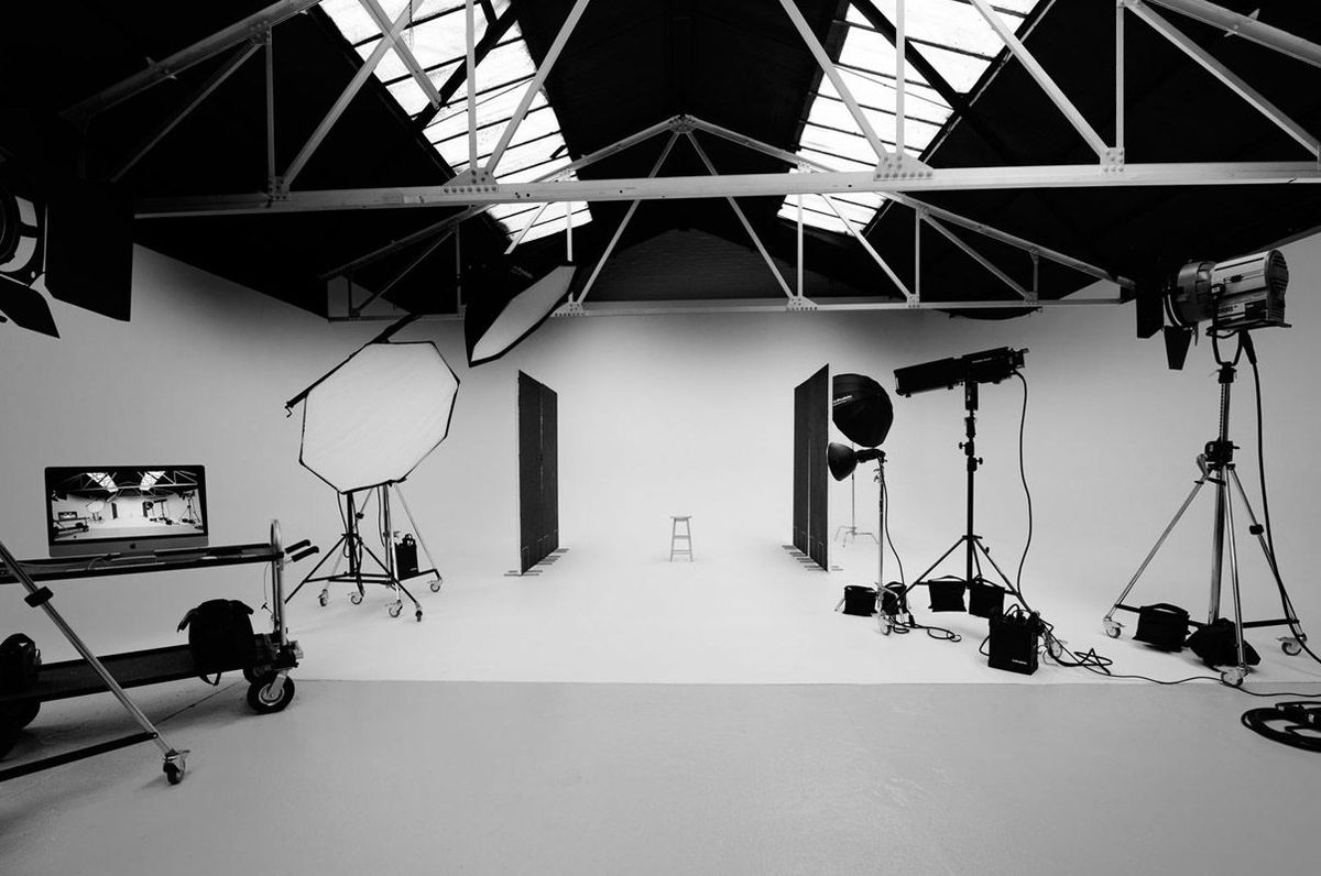 Black and white studio stage with production equipment